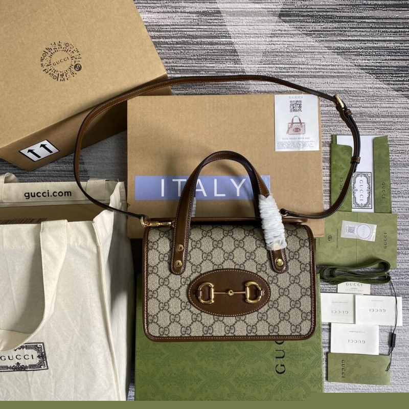 G*u*i top handle bags